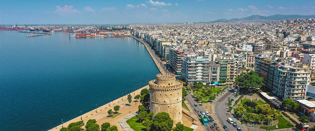 Aerial panoramic photo of Thessaloniki by sea side and the White Tower